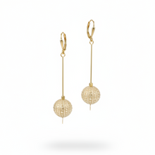 Load image into Gallery viewer, Gold earrings with spherical designs on a white background