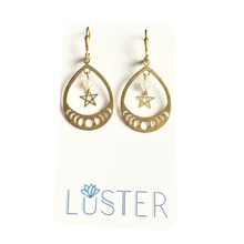 Load image into Gallery viewer, Gold teardrop earrings with star design on a white background, featuring the 'Luster' brand.