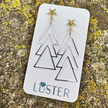 Load image into Gallery viewer, Silver and gold geometric shaped earrings displayed on a white card with the brand name 'LUSTER'.
