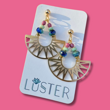 Load image into Gallery viewer, Earrings on a Luster branded card against a pink background
