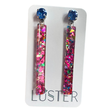 Load image into Gallery viewer, Multicolored glittery earrings on a white card with 'Luster' branding.
