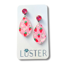 Load image into Gallery viewer, Pink strawberry patterned earrings on a Luster branded card

